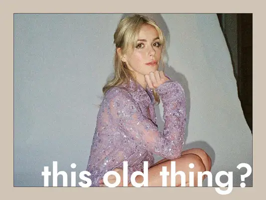 Kiernan Shipka wearing a purple dress