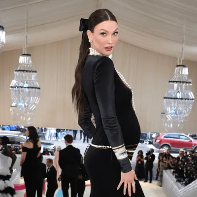 Camila Marrone, Karlie Kloss, and Sydney Sweeney wearing hair accessories at the 2023 Met Gala