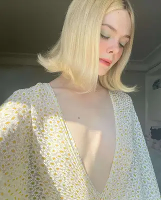 Elle Fanning showing off her blue eyeshadow.