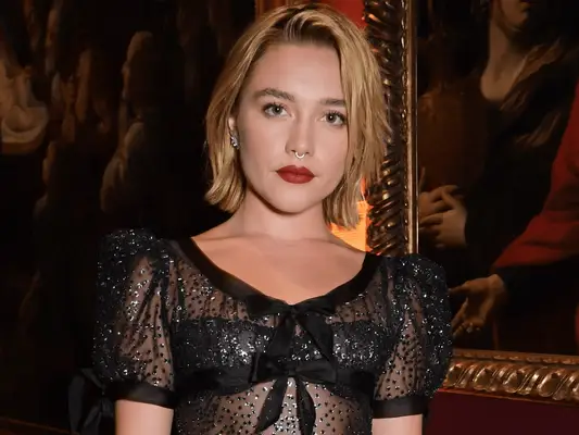Florence Pugh with a short blonde bob.