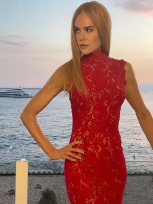 Nicole Kidman poses with her strawberry blonde hair on the Mediterranean coast.