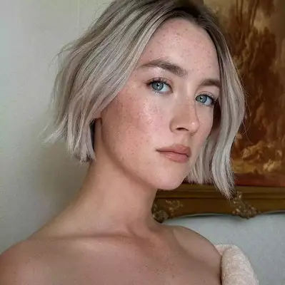 Saoirse Ronan with bangs on the red carpet