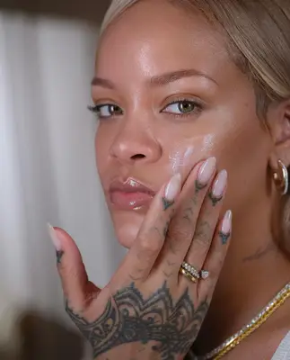 Rihanna with a milky manicure. 