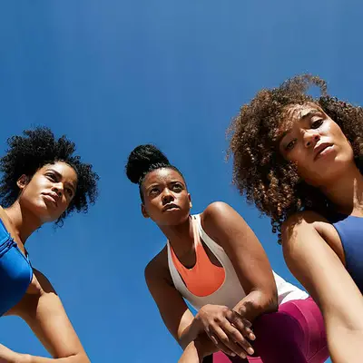 Three black women in athletic attire