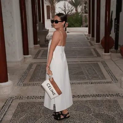 Ashley Tisdale wearing a white dress