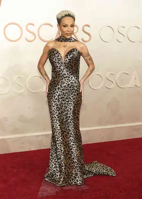 Doja Cat wears a metallic leopard print gown to the 2025 Oscars