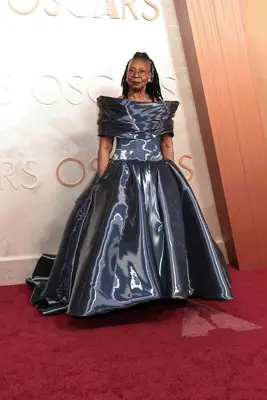 Whoopi Goldberg wears a liquid metallic gown to the 2025 Oscars