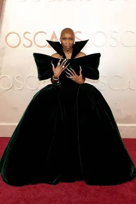 Cynthia Erivo wears a dark green velvet gown and dramatic manicure to the 2025 Oscars