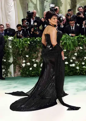 Ashley Graham wears a black sparkly gown to the 2024 Met Gala