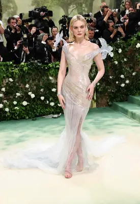 Elle Fanning wears a sculptural sheer gown to the 2024 Met Gala