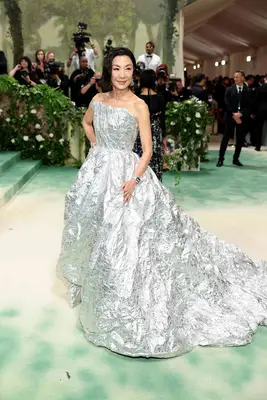 Michelle Yeoh wears a crinkled silver gown to the 2024 Met Gala