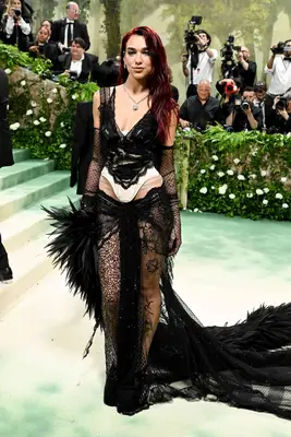 Dua Lipa wears a sheer black Marc Jacobs look to the 2024 Met Gala