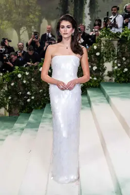 Kaia Gerber wears a white sequined Prada gown to the 2024 Met Gala