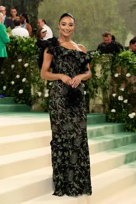 Rachel Smith wears a black and green gown to the 2024 Met Gala