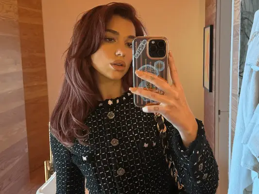 Dua Lipa taking a selfie