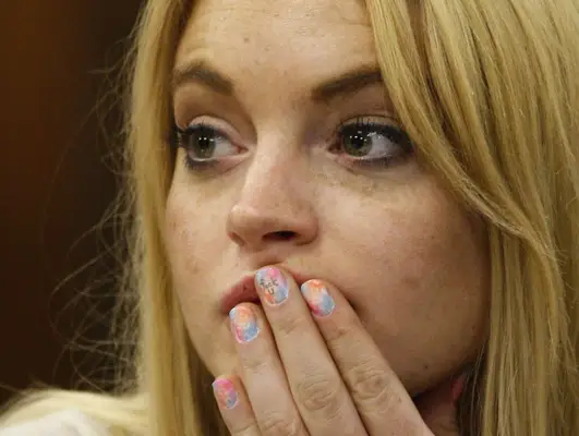 Lindsay Lohan wears her iconic fingernails during a court date in July 2010.