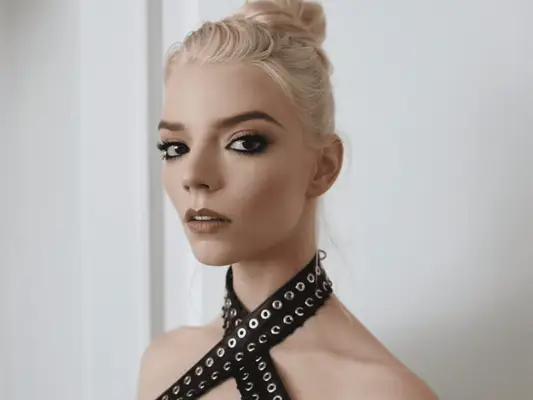 Anya Taylor-Joy wearing a black dress