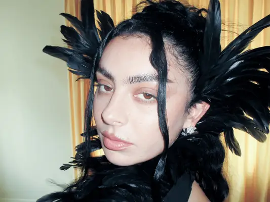 Charli XCX wearing a messy bun at the 2025 Met Gala