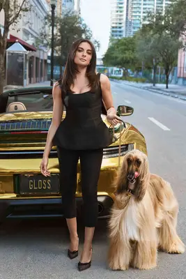 Paige Desorbo walking a dog