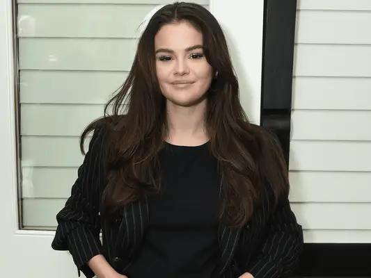 Selena Gomez wearing a blazer
