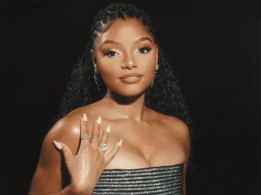 Halle Bailey wearing a gown