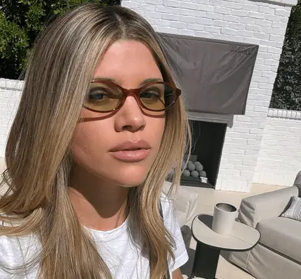 Sofia Richie Grainge wearing sunglasses. 