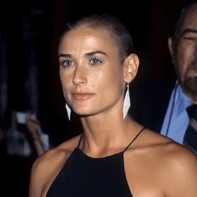Demi Moore with short black bob and a natural pink lipgloss