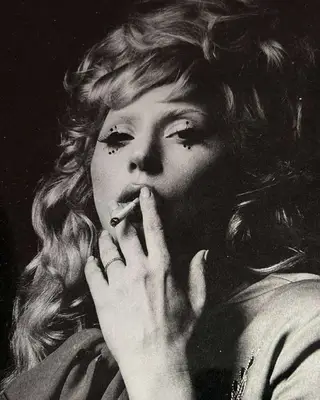 Lady Gaga smoking a cigarette. 