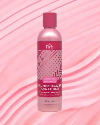 A pink cream smear background with a bottle of pink lotion overlayed