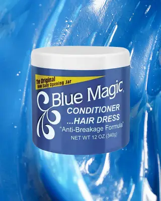 a tub of blue magic against a blue grease background