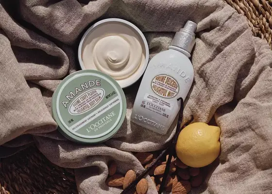 loccitane products on a linen background