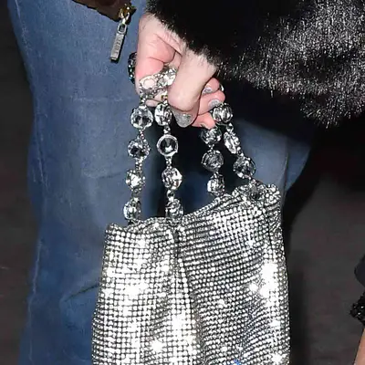 Up close of Taylor swifts sparkly silver birthday manicure