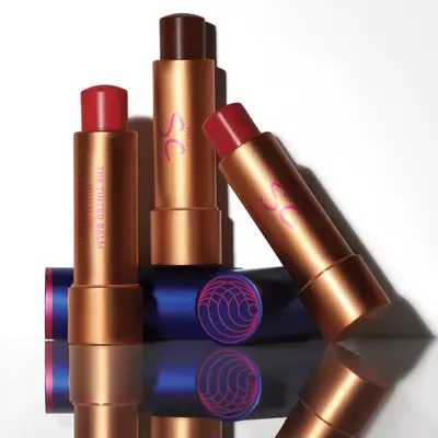 Three Augustinus Bader x Sofia Coppola lip balms