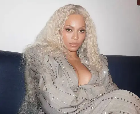 Beyoncé wearing a suit. 