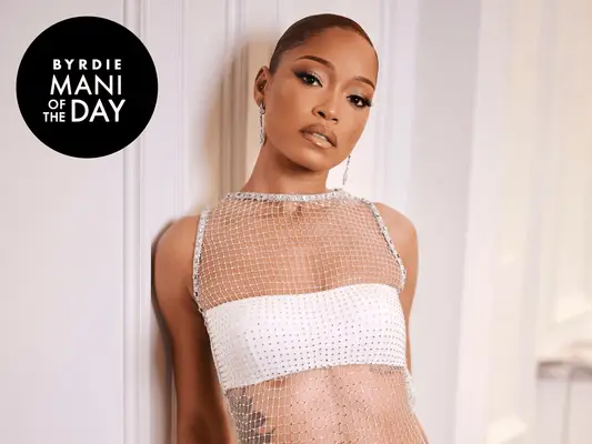 Keke Palmer wearing a white gown