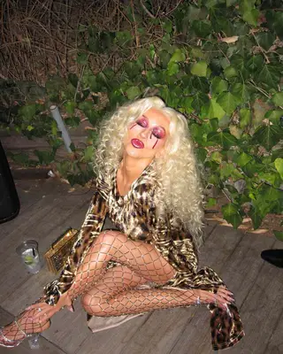 Xtina with curly hair. 