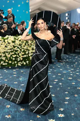 Demi Moore poses on the red carpet at the 2025 Met Gala.