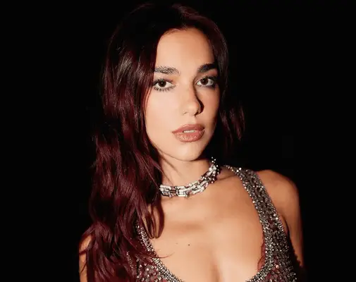 Dua Lipa with red hair. 