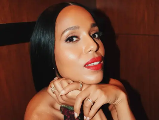 Kerry Washington with gold ombrÃ© French tip nails and red lipstick