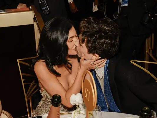 Kylie Jenner and Timothee Chalamet kissing at the 2025 Golden Globes