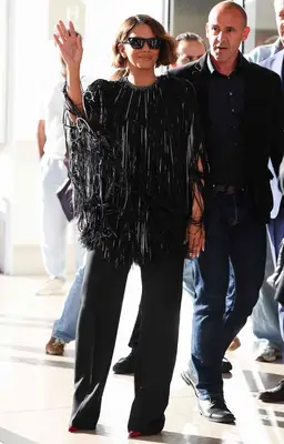 Halle Berry shows off her fringed black outfit while at Cannes Film Festival.