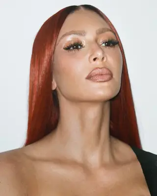 Kim Kardashian with red hair. 
