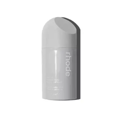 grey bottle of rhode skin peptide glazing fluid
