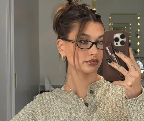 Hailey Bieber taking a selfie. 