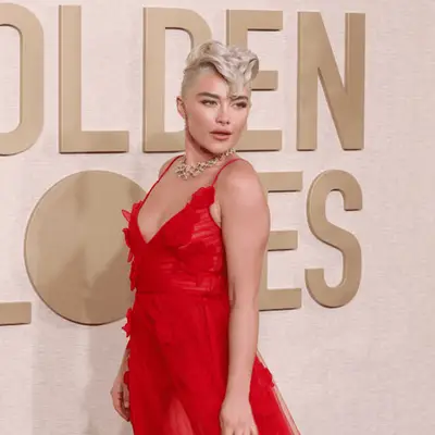 florence pugh in red dress and platinum faux hawk at golden globes