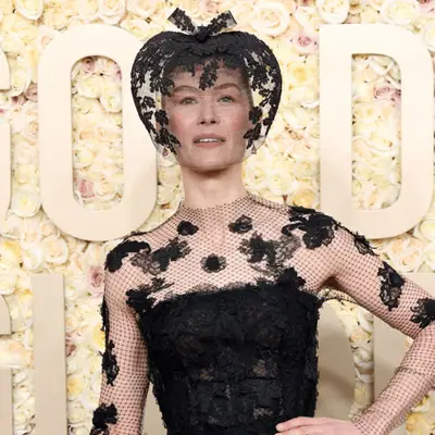 Rosamund Pike wearing black veil at golden globes