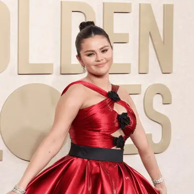 selena gomez in red dress and ballet bun at golden globes