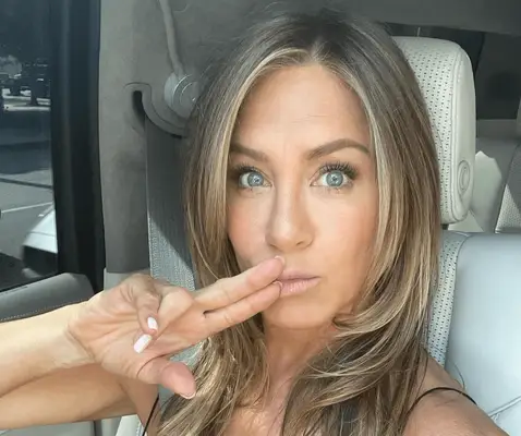 Jennifer Aniston taking a selfie. 