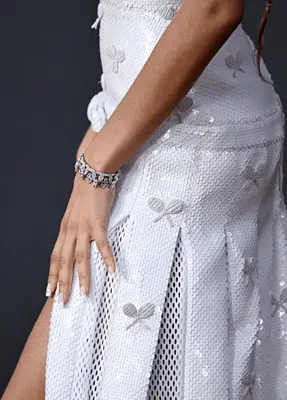 Zendaya wearing a white dress to the 