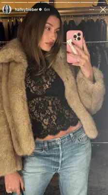 Hailey Bieber taking a selfie. 